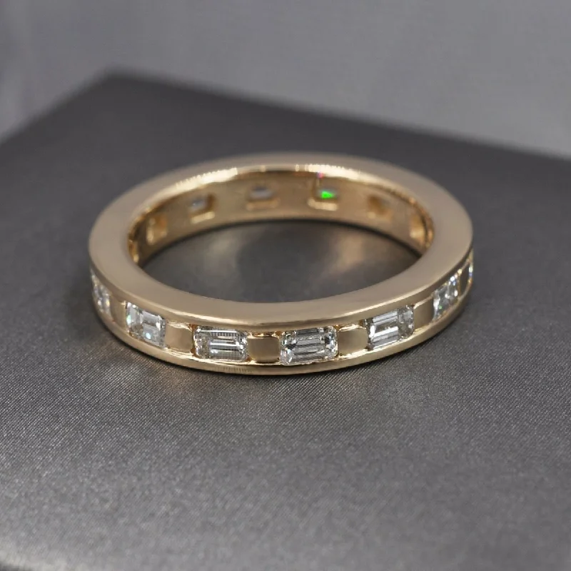 Stunning 2.50 CT Emerald Cut Diamond Eternity Ring in 14KT Yellow Gold