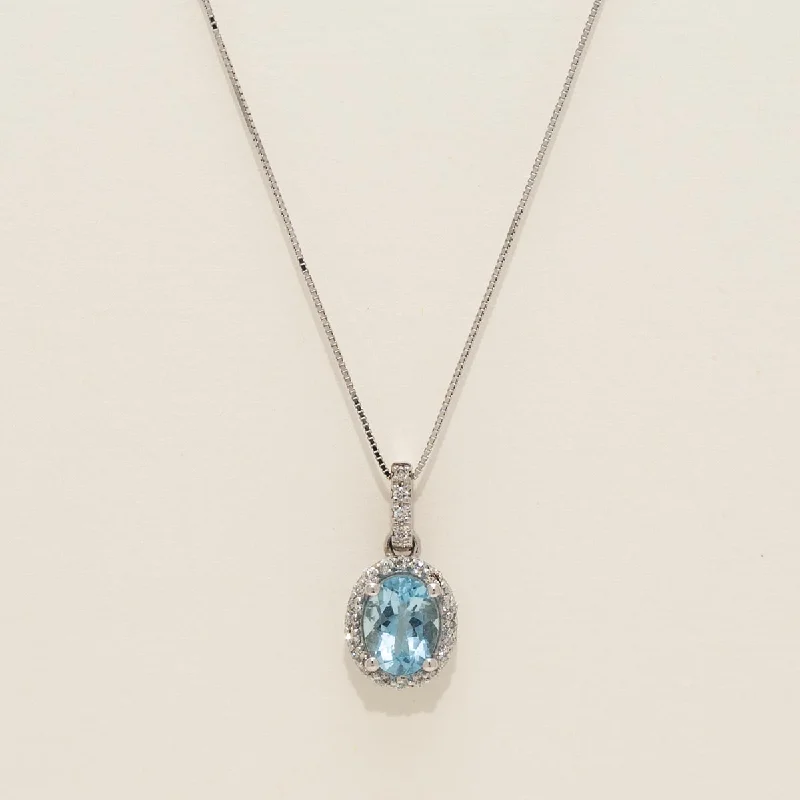 Oval Aquamarine Halo Necklace in 14kt White Gold with Diamonds (1/4ct tw)