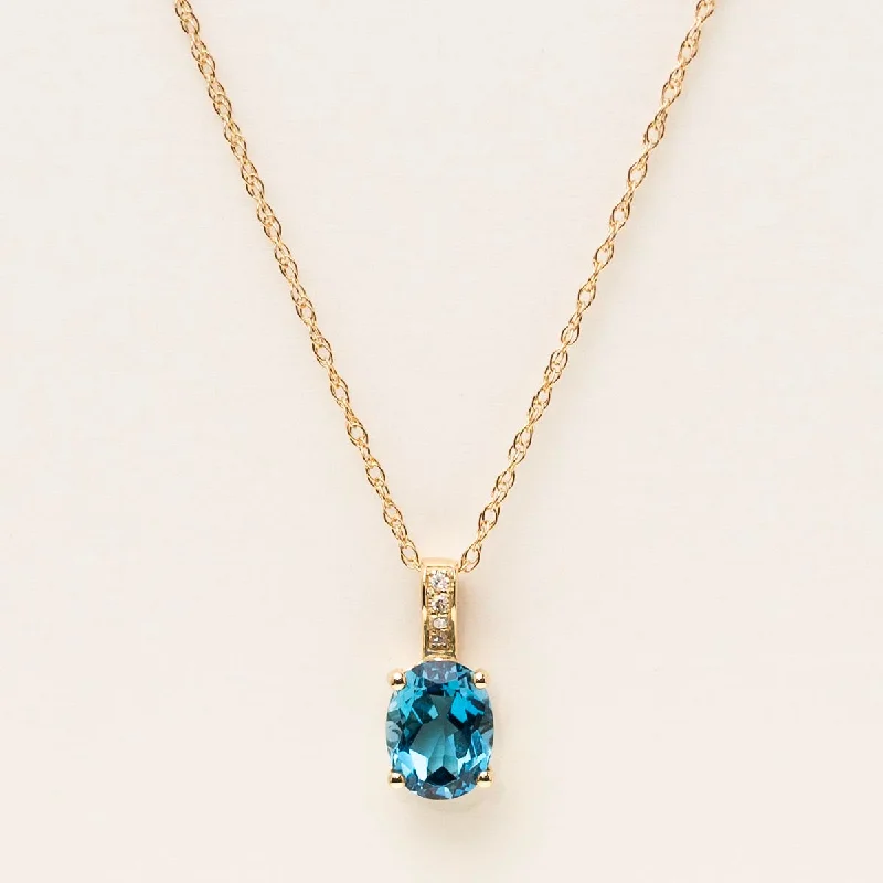 Oval London Blue Topaz Necklace in 14kt Yellow Gold with Diamonds (.02ct tw)